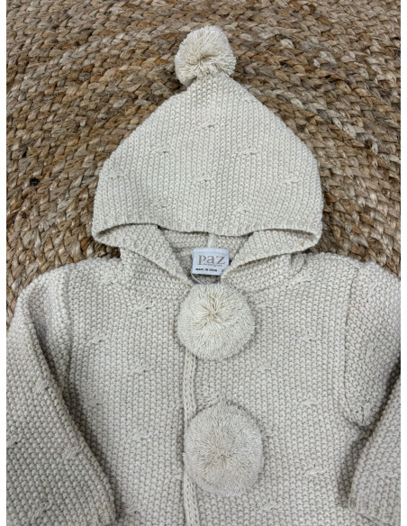 Chaquetón de punto con capucha y pompones